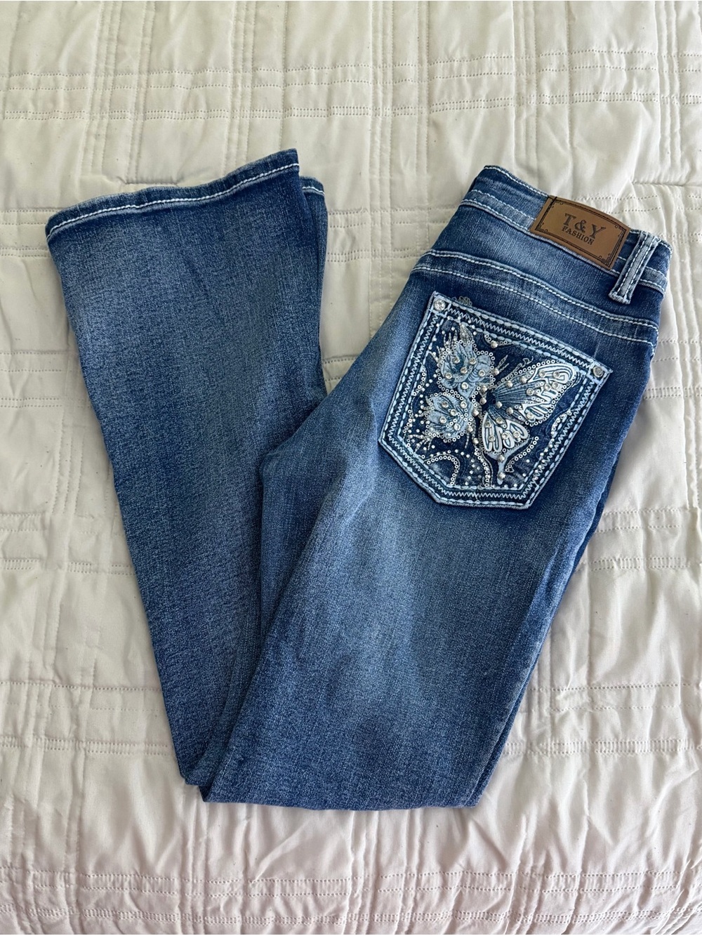 Women's Blue Boot Cut Jeans with Embroidered Butterfly Pocket